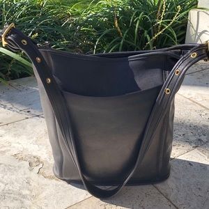 Coach black leather bag. (More pictures to come)